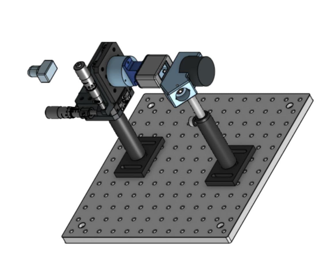 CAD model of the soil analyzer bench setup: stages and lens tubes on posts above an optical breadboard